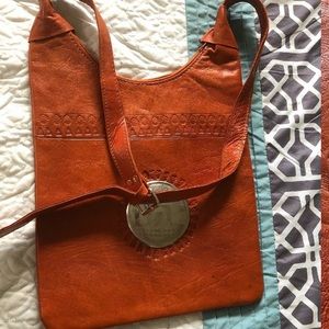 orange leather Flat handbag.